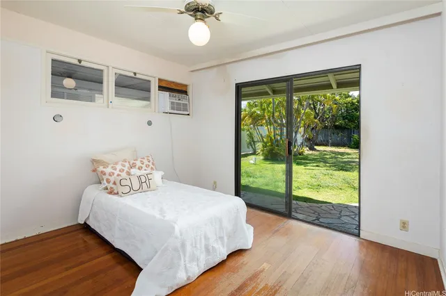a view of a swimming pool with a couches in a patio