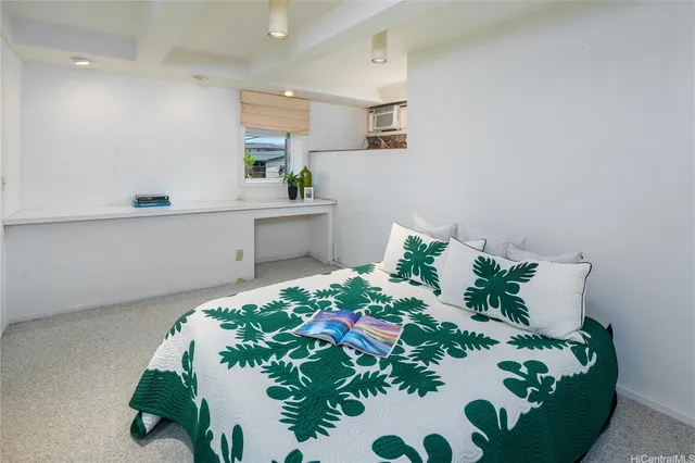 a kitchen with a sink a refrigerator and cabinets