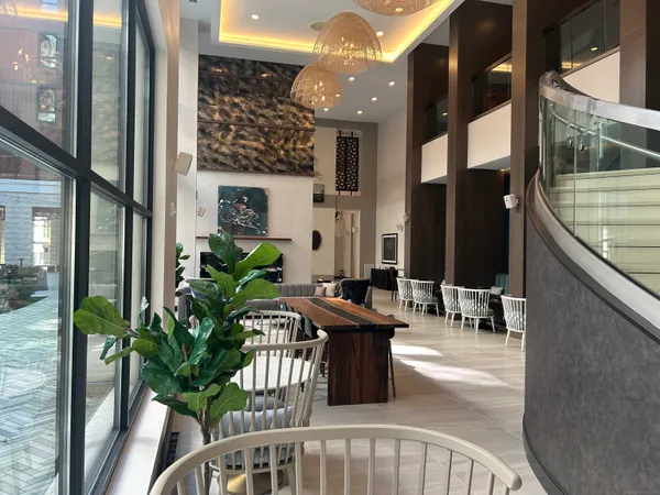 a view of a balcony with chairs