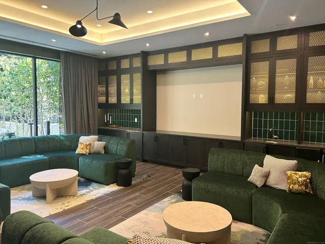 a view of a patio with a table and chairs