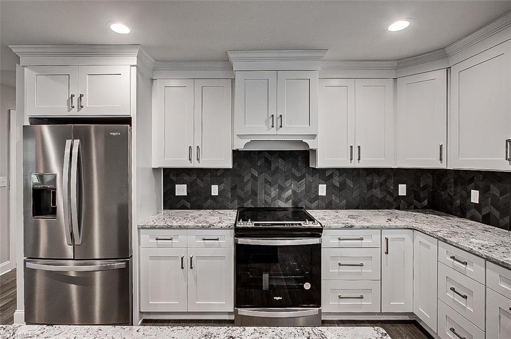 3150 Maple Way Staley, NC 27355 - Photo 13 of 27 Whirlpool Refrigerator, Electric Range & Vent Hood Included
