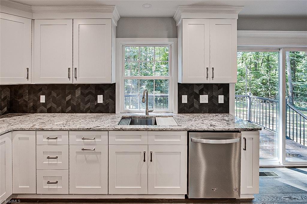 3150 Maple Way Staley, NC 27355 - Photo 14 of 27 Whirpool DishwasherCustom Tile Back Splash