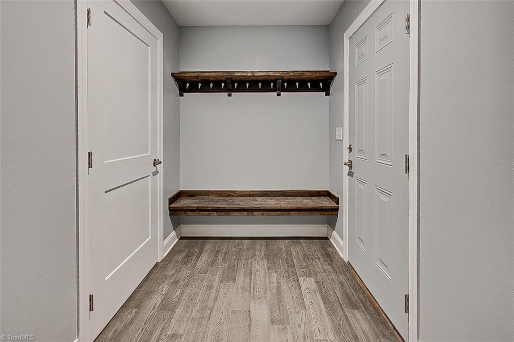 3150 Maple Way Staley, NC 27355 - Photo 20 of 27 Laundry Room- custom built bench & shelving