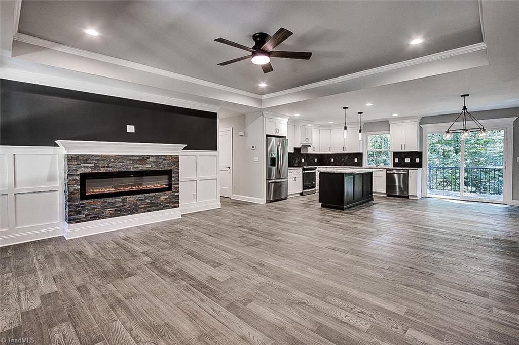 3150 Maple Way Staley, NC 27355 - Photo 7 of 27 Electirc FP with rock surround.