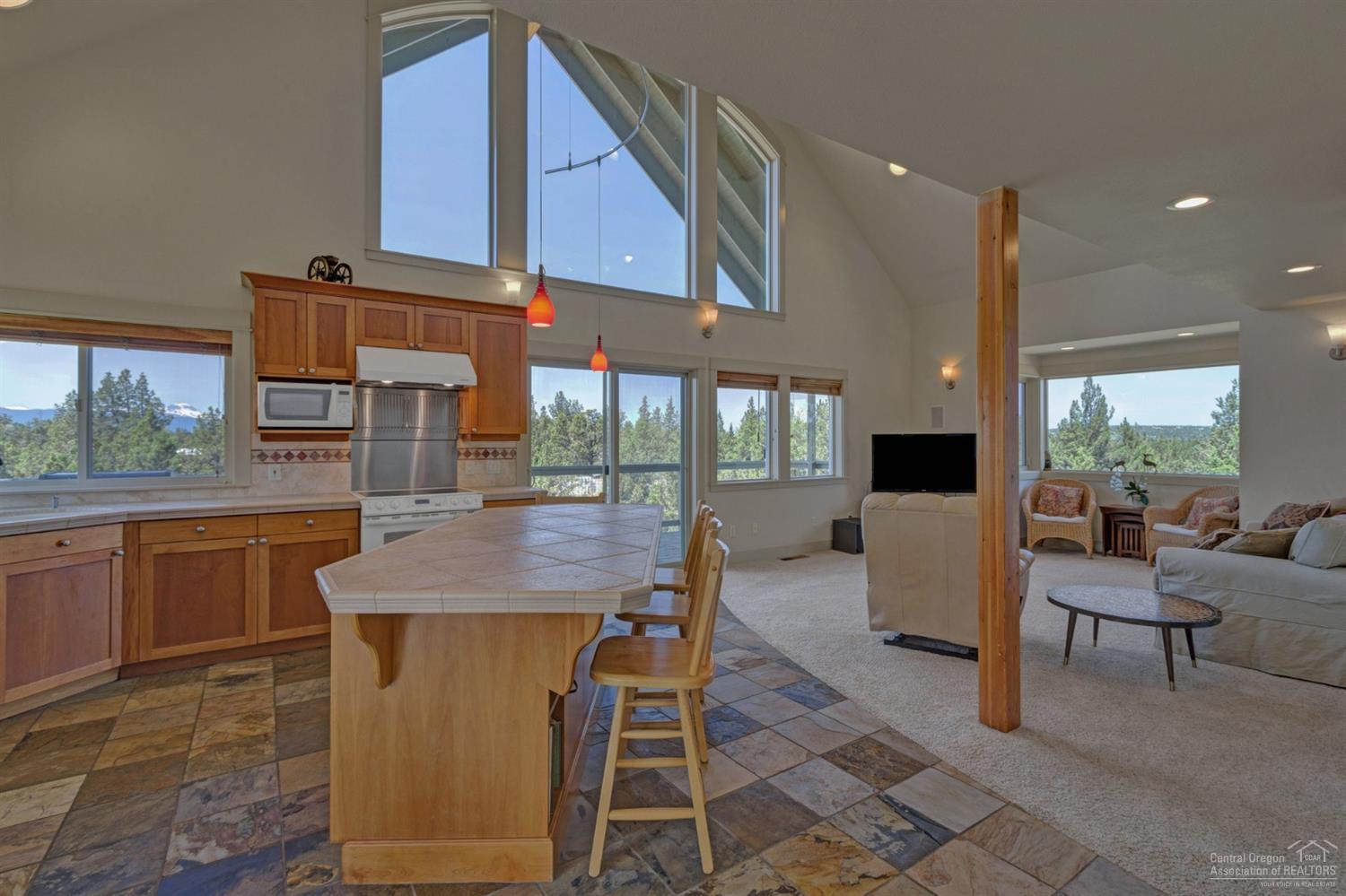 64405 Deschutes Market Road Bend, OR 97701 - Photo 7 of 25 a dining table tennis pool table and chairs
