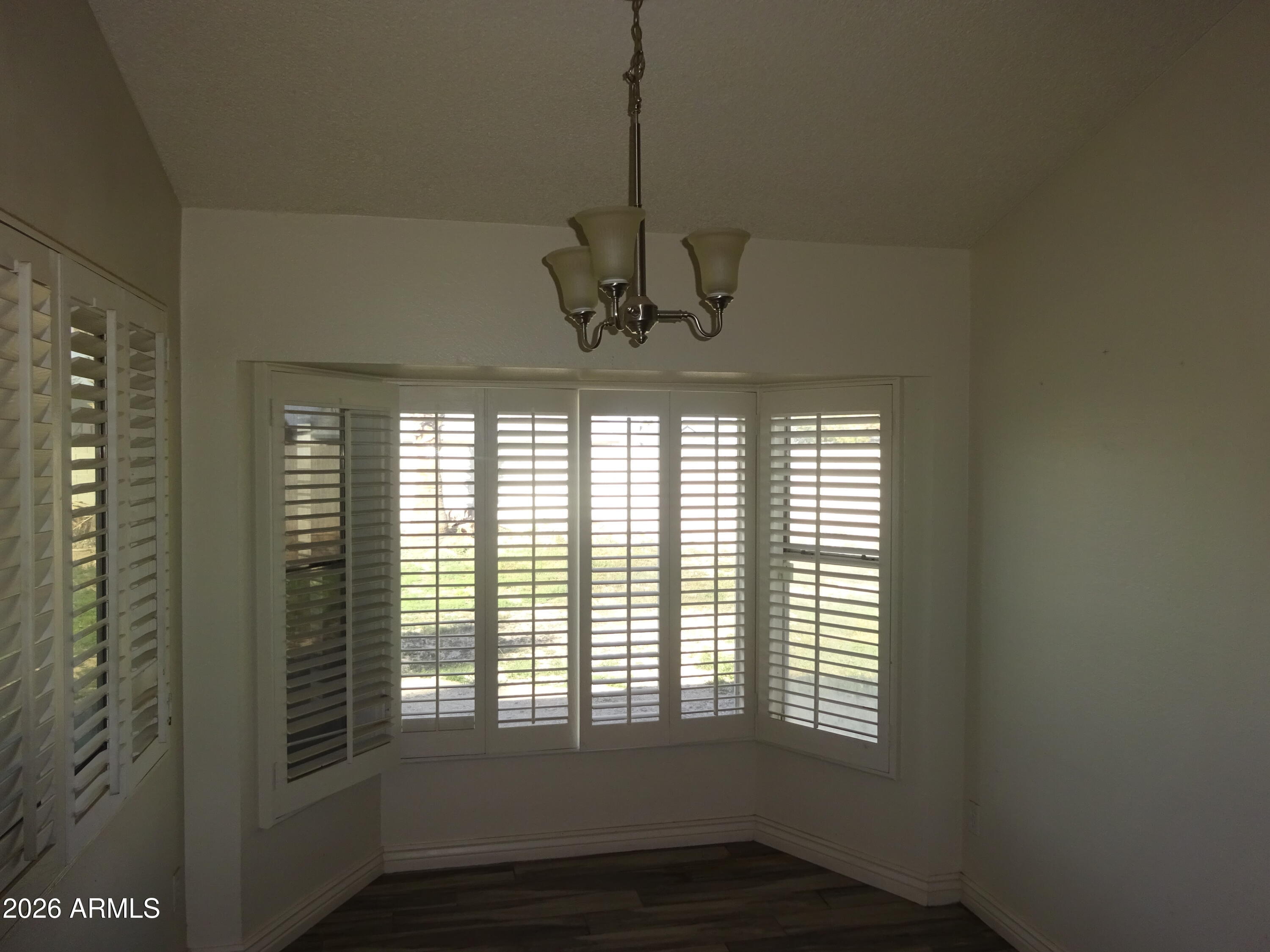 8602 West Wethersfield Road Peoria, AZ 85381 - Photo 12 of 26 a view of a livingroom with a window