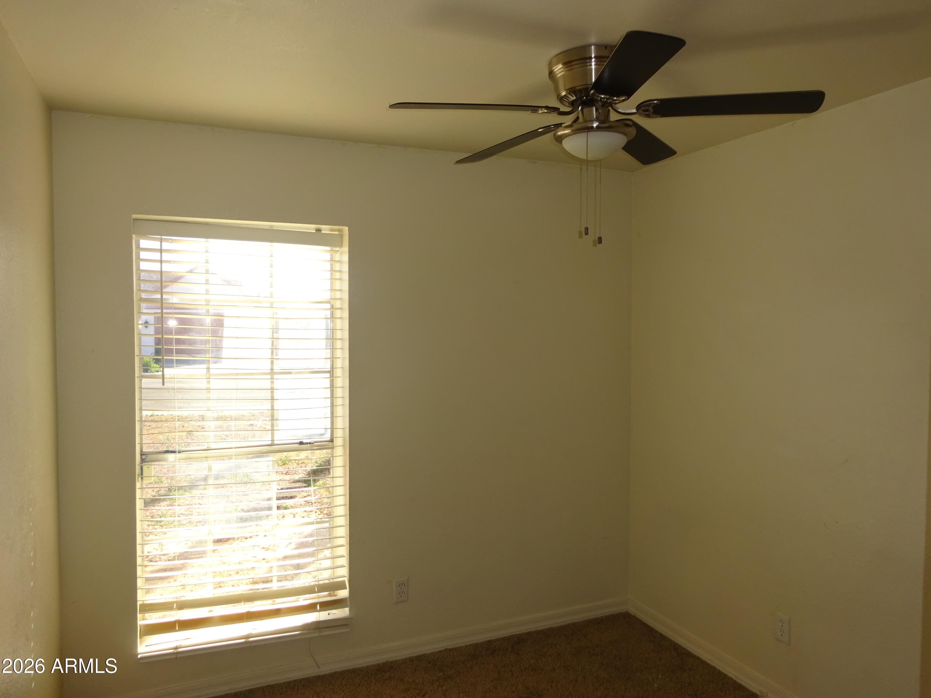 8602 West Wethersfield Road Peoria, AZ 85381 - Photo 16 of 26 a view of a window in a small room