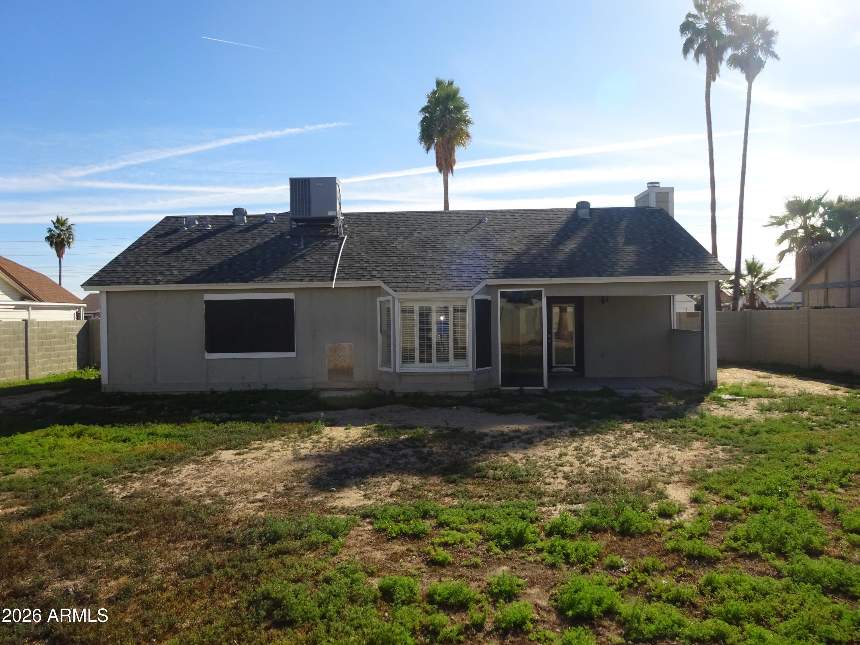 8602 West Wethersfield Road Peoria, AZ 85381 - Photo 24 of 26 a house view with a garden space