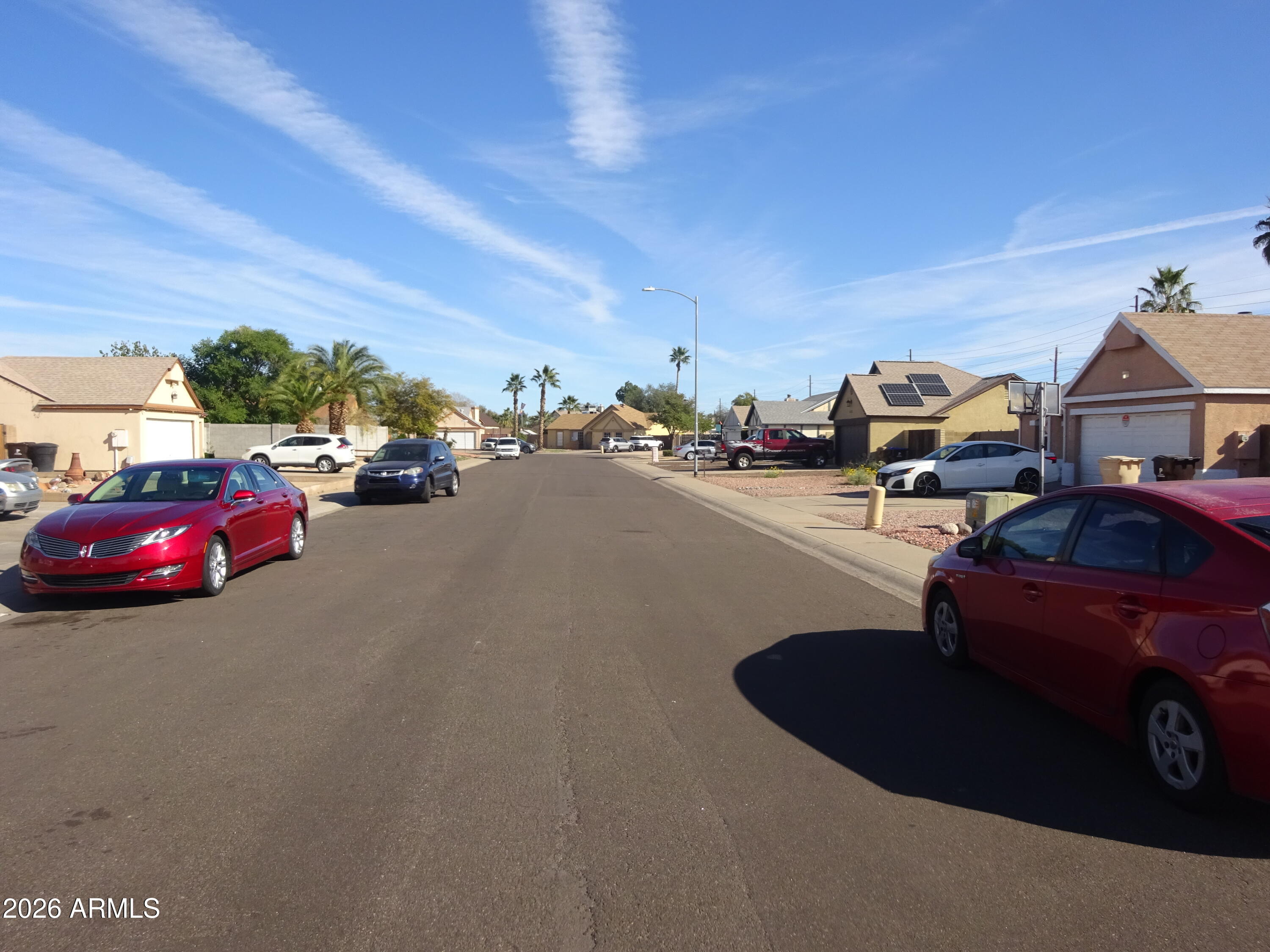 8602 West Wethersfield Road Peoria, AZ 85381 - Photo 6 of 26 a view of a street
