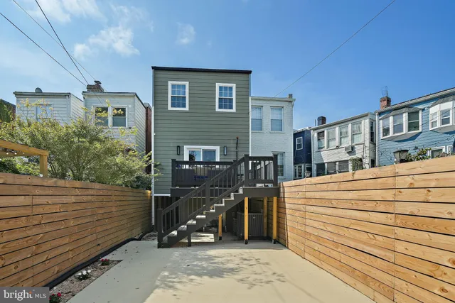 a view of a building with sitting area