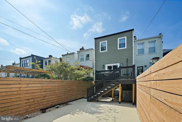 a picture of a bathroom with a sink and a mirror