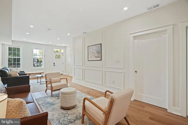a kitchen with a table and chairs
