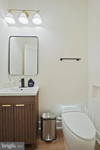 a bedroom with a bed and flat screen tv