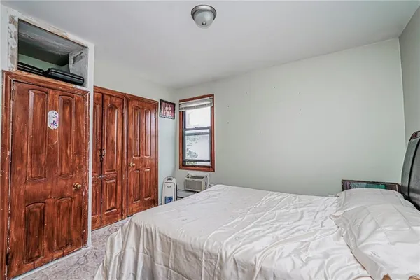 a bathroom with a sink a toilet and shower curtain
