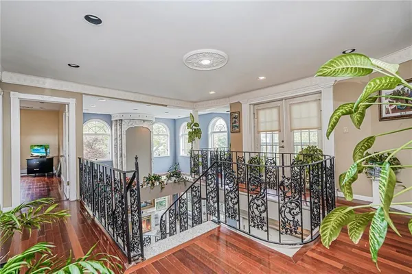 wooden floor view with an entryway