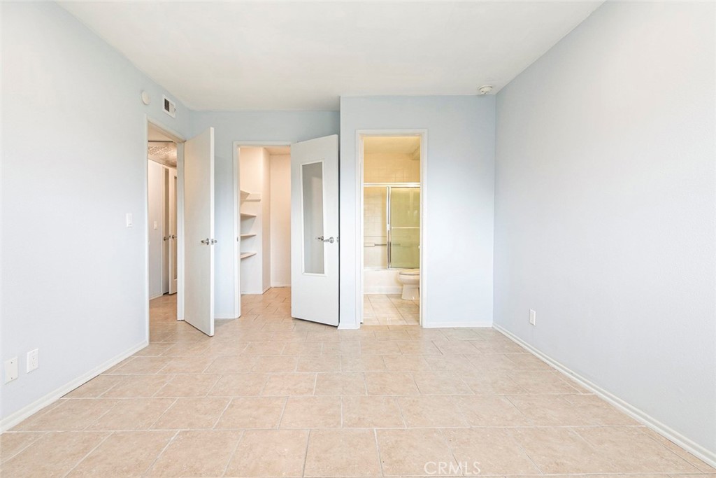 121 Sinclair Avenue, Unit 122 Glendale, CA 91206 - Photo 11 of 23 an empty room with a bathroom