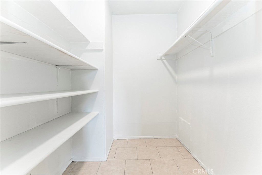 121 Sinclair Avenue, Unit 122 Glendale, CA 91206 - Photo 12 of 23 a view of an empty walk in closet