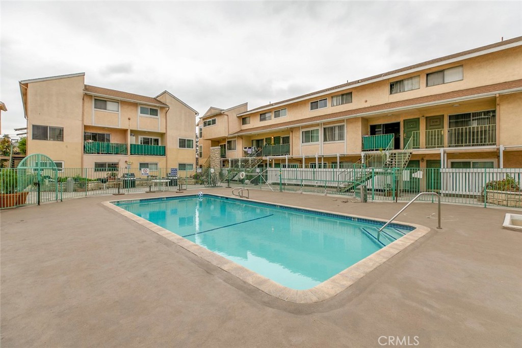121 Sinclair Avenue, Unit 122 Glendale, CA 91206 - Photo 16 of 23 a view of house with swimming pool outdoor seating