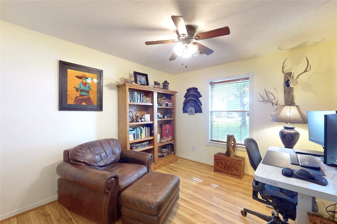 142 Sentinel Oaks Pinehurst, TX 77362 - Photo 20 of 41 a living room with furniture and a wooden floor