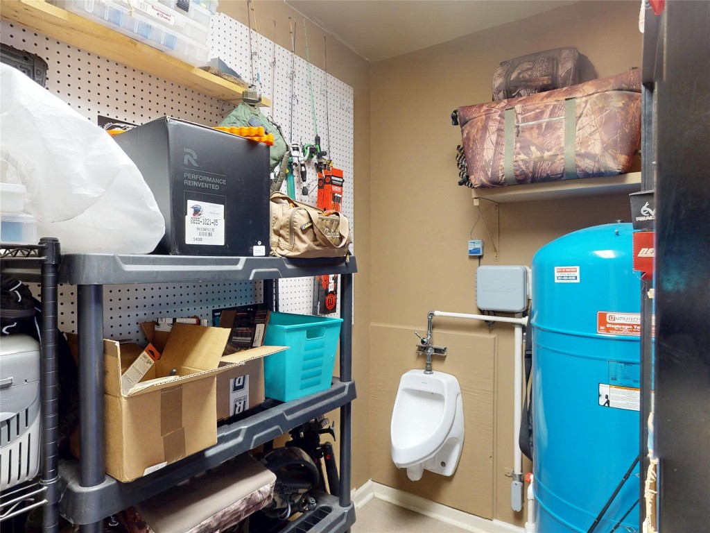 142 Sentinel Oaks Pinehurst, TX 77362 - Photo 24 of 41 Garage access to pump and toilet.