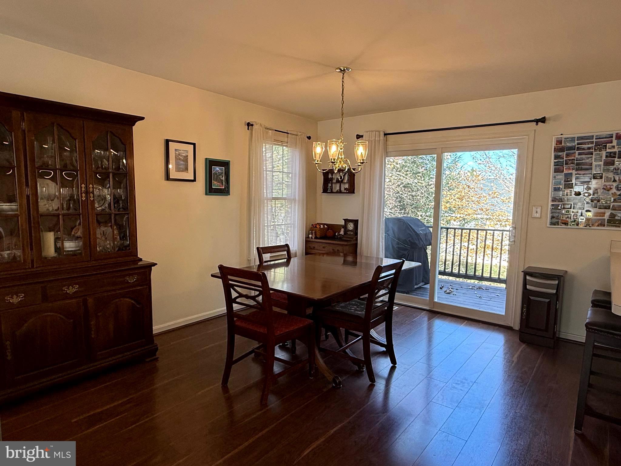 51 Finch Lane Falling Waters, WV 25419 - Photo 15 of 37 a view of a dining room with furniture window and wooden floor