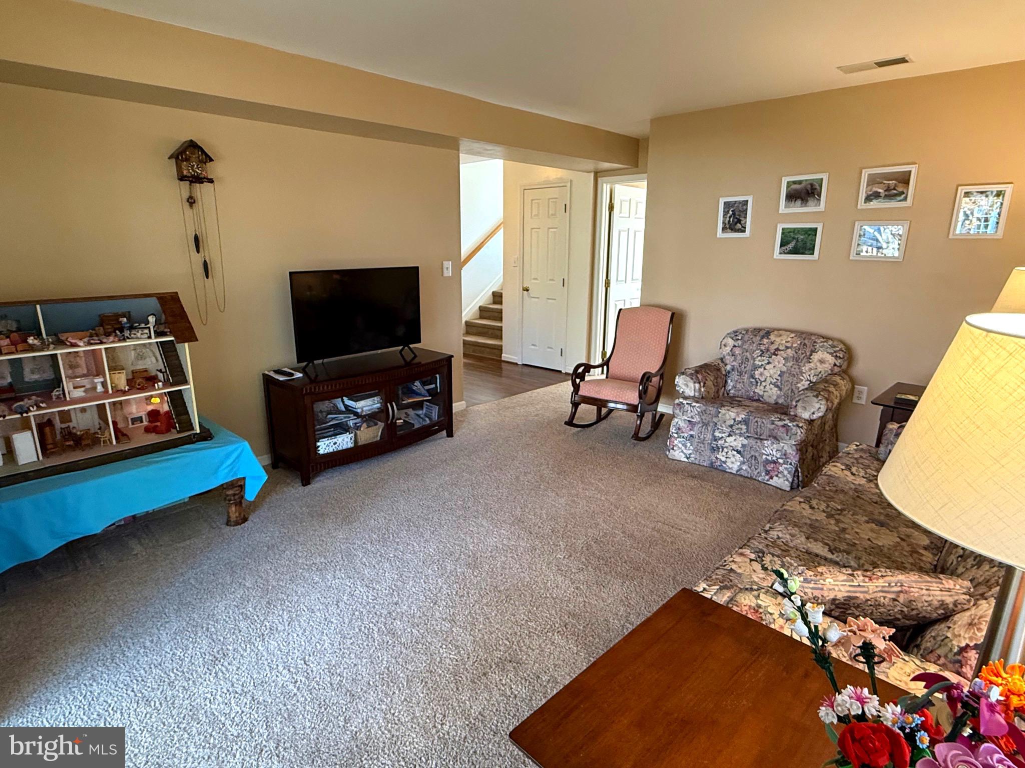 51 Finch Lane Falling Waters, WV 25419 - Photo 17 of 37 a living room with furniture and a flat screen tv
