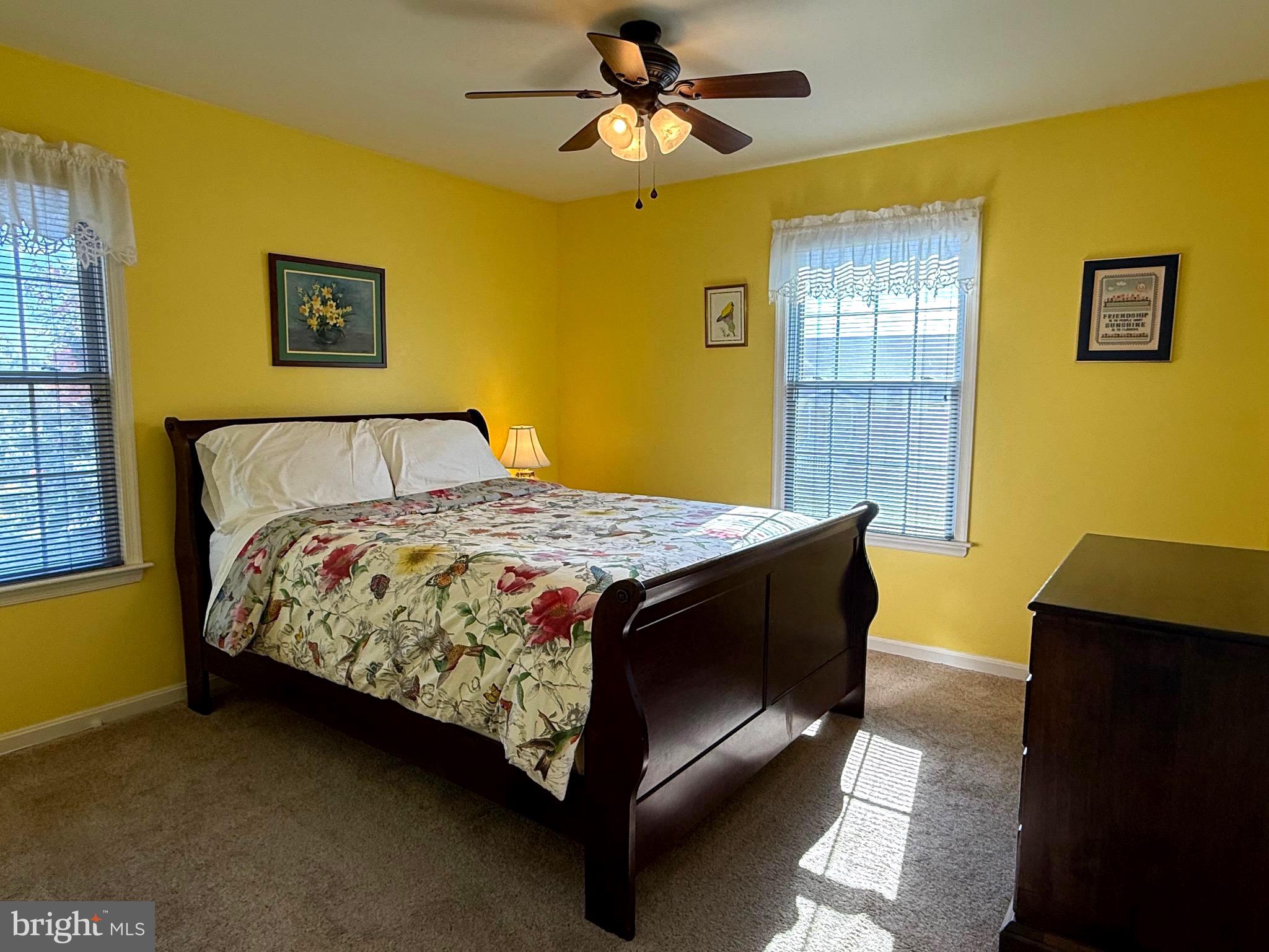 51 Finch Lane Falling Waters, WV 25419 - Photo 25 of 37 a bed sitting in a bedroom next to a window