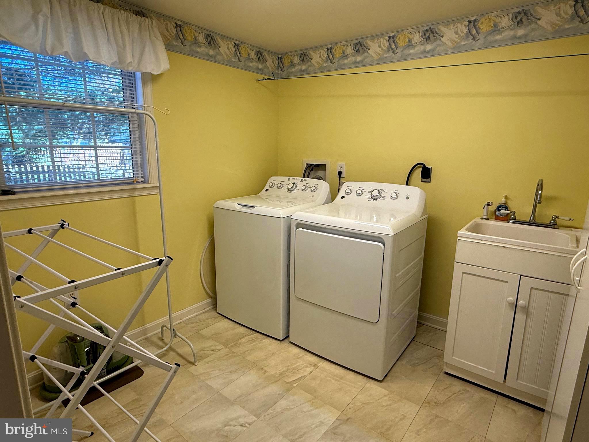 51 Finch Lane Falling Waters, WV 25419 - Photo 30 of 37 a utility room with dryer and washer