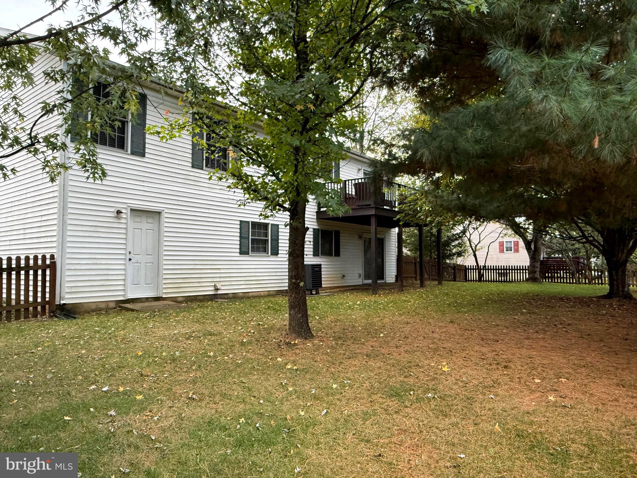51 Finch Lane Falling Waters, WV 25419 - Photo 3 of 37 a house with trees in the background