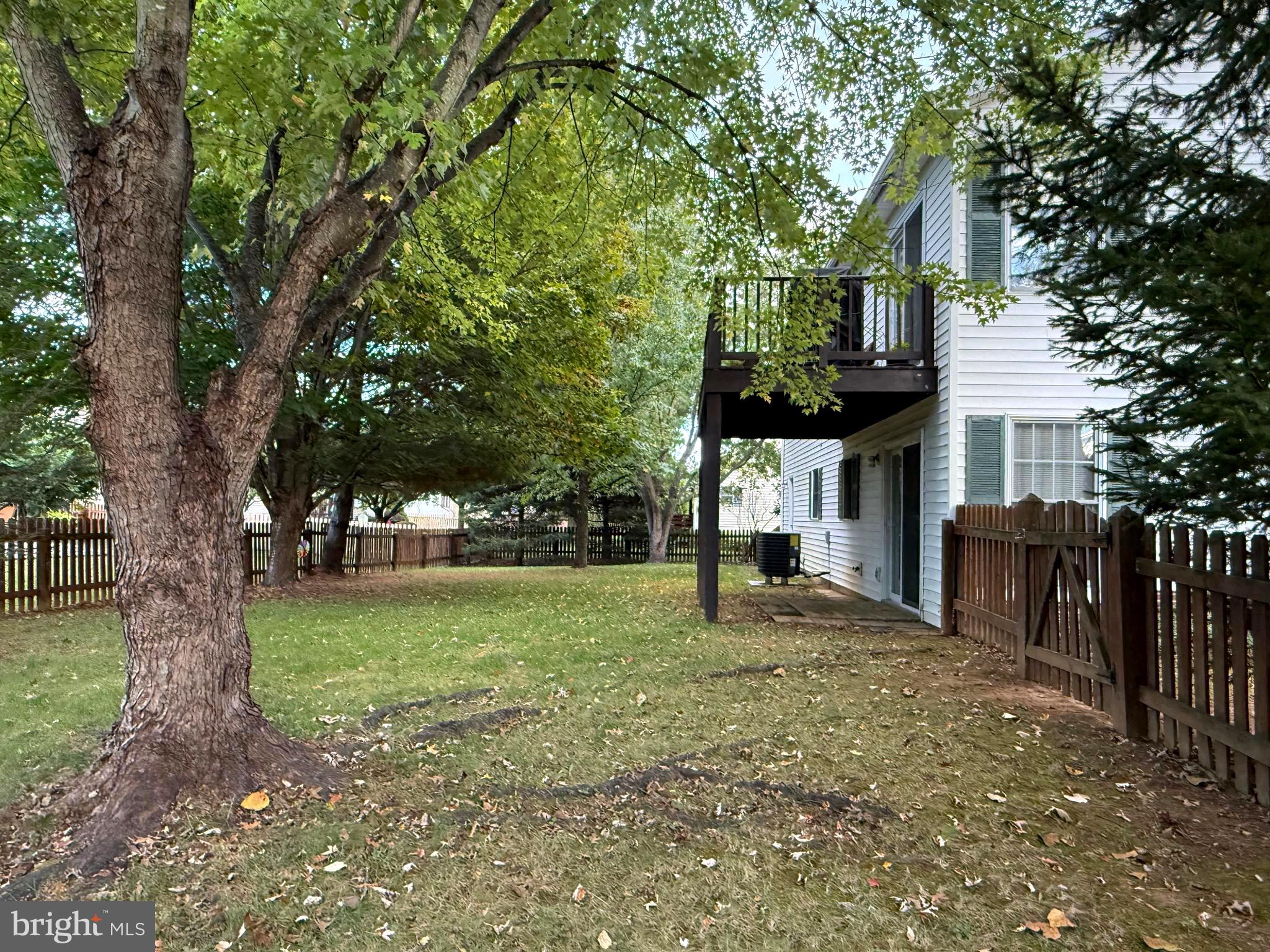 51 Finch Lane Falling Waters, WV 25419 - Photo 5 of 37 a view of a house with a tree in the yard