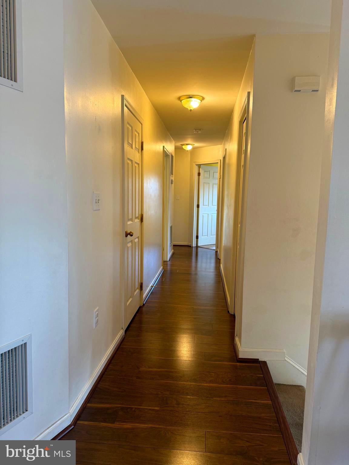 51 Finch Lane Falling Waters, WV 25419 - Photo 7 of 37 a view of a hallway with wooden floor