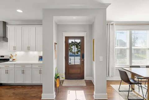 a view of a kitchen and dining room
