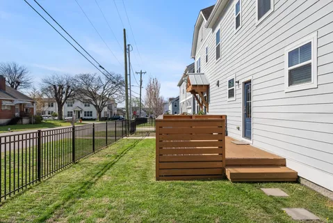 a view of a deck with a yard