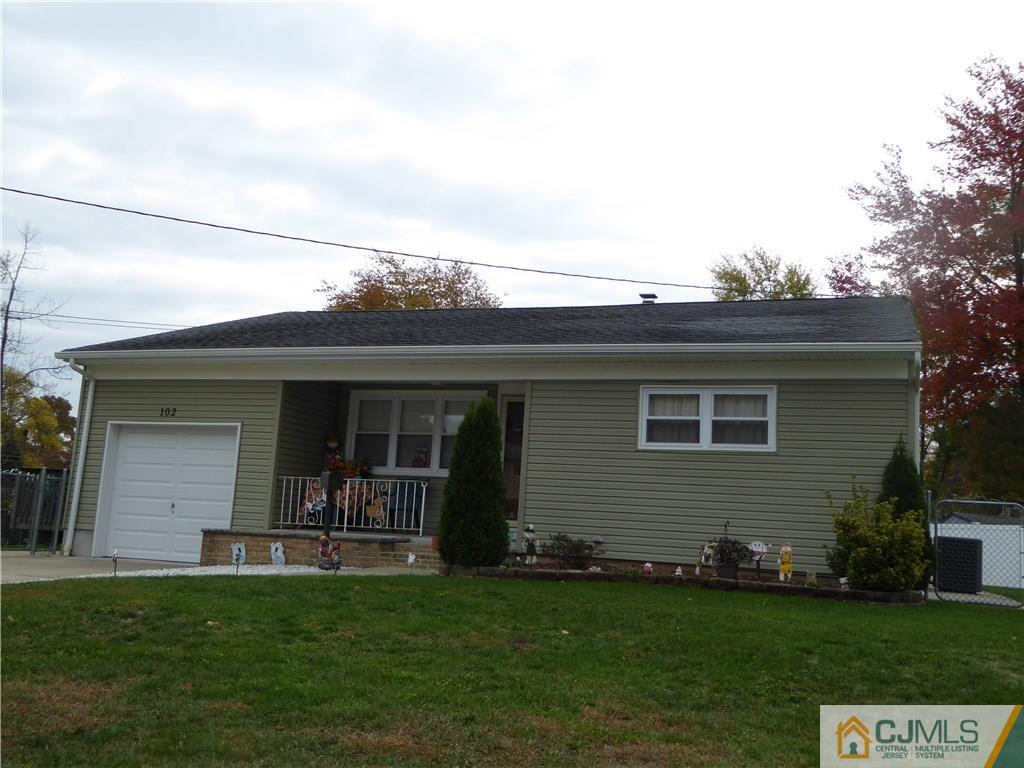 102 Stony Road Edison, NJ 08817 - Photo 1 of 21 a view of a house with a backyard