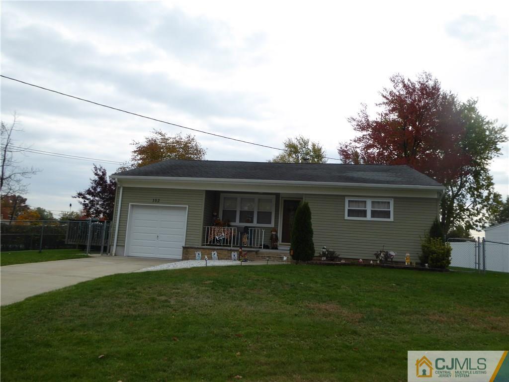102 Stony Road Edison, NJ 08817 - Photo 2 of 21 a front view of house with yard and green space