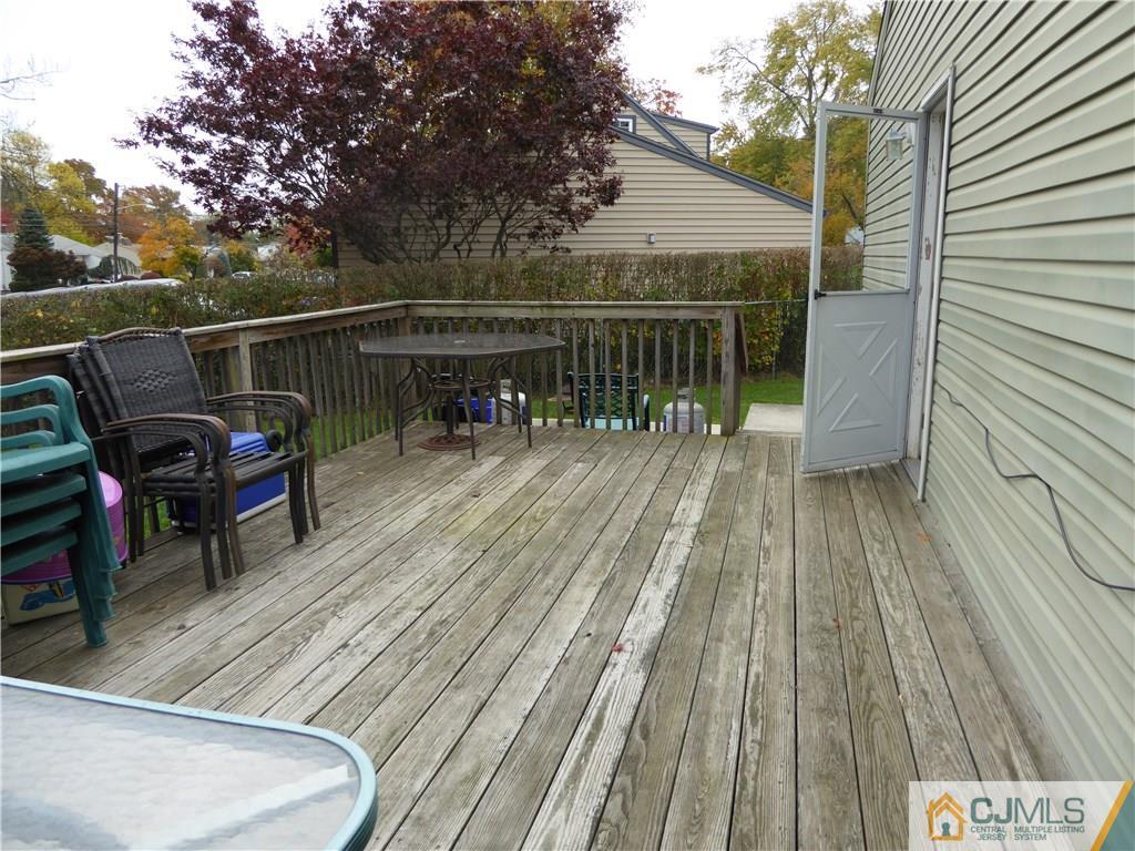 102 Stony Road Edison, NJ 08817 - Photo 17 of 21 a view of roof deck with patio