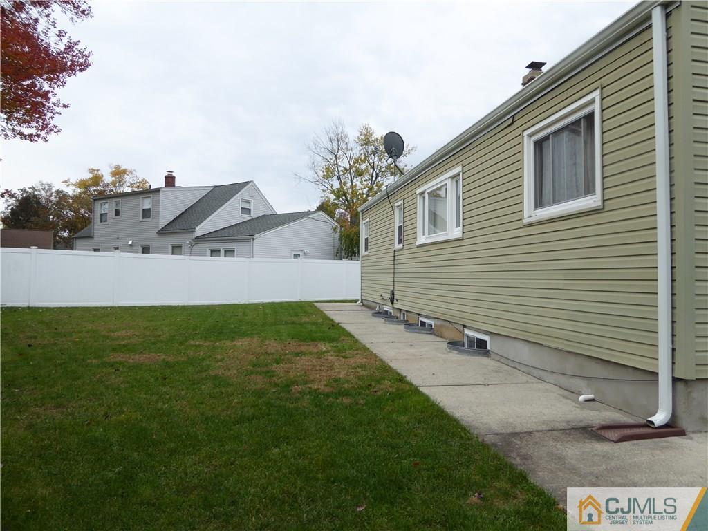 102 Stony Road Edison, NJ 08817 - Photo 19 of 21 a view of a back yard of the house