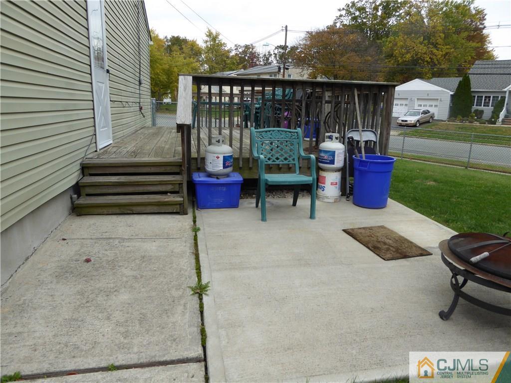 102 Stony Road Edison, NJ 08817 - Photo 20 of 21 a view of a bench in the patio