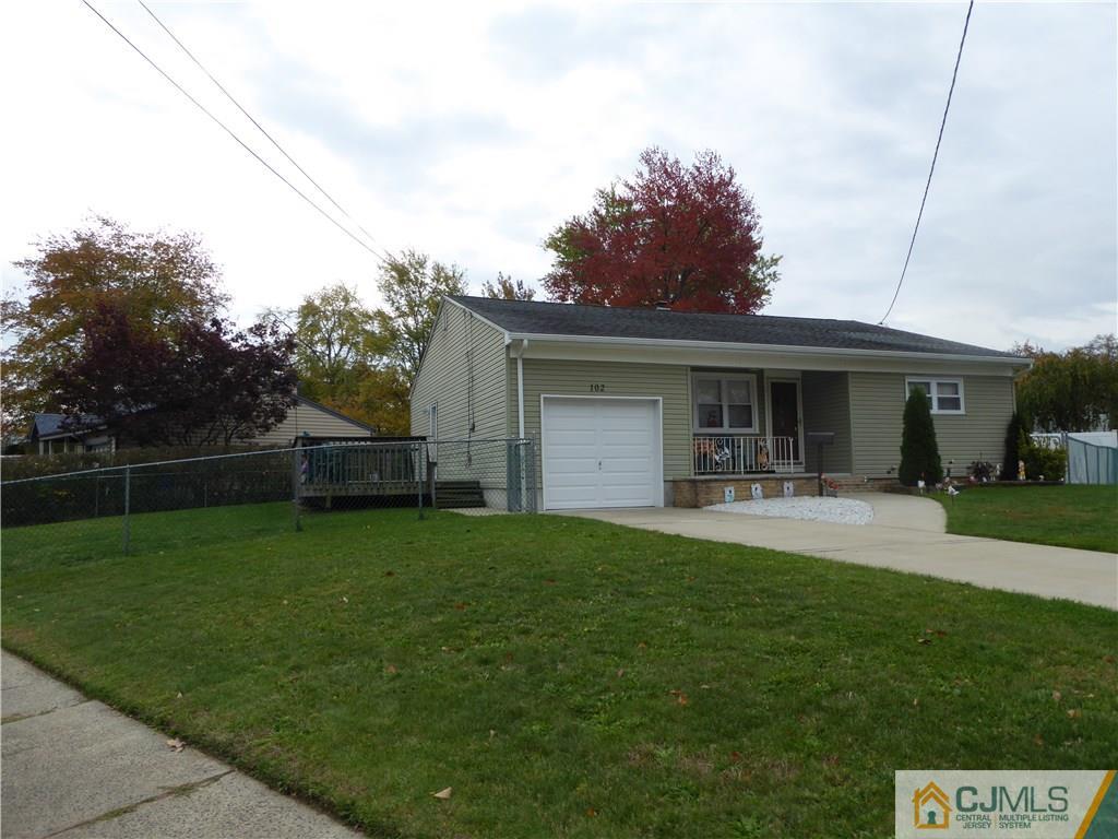 102 Stony Road Edison, NJ 08817 - Photo 4 of 21 a front view of a house with garden