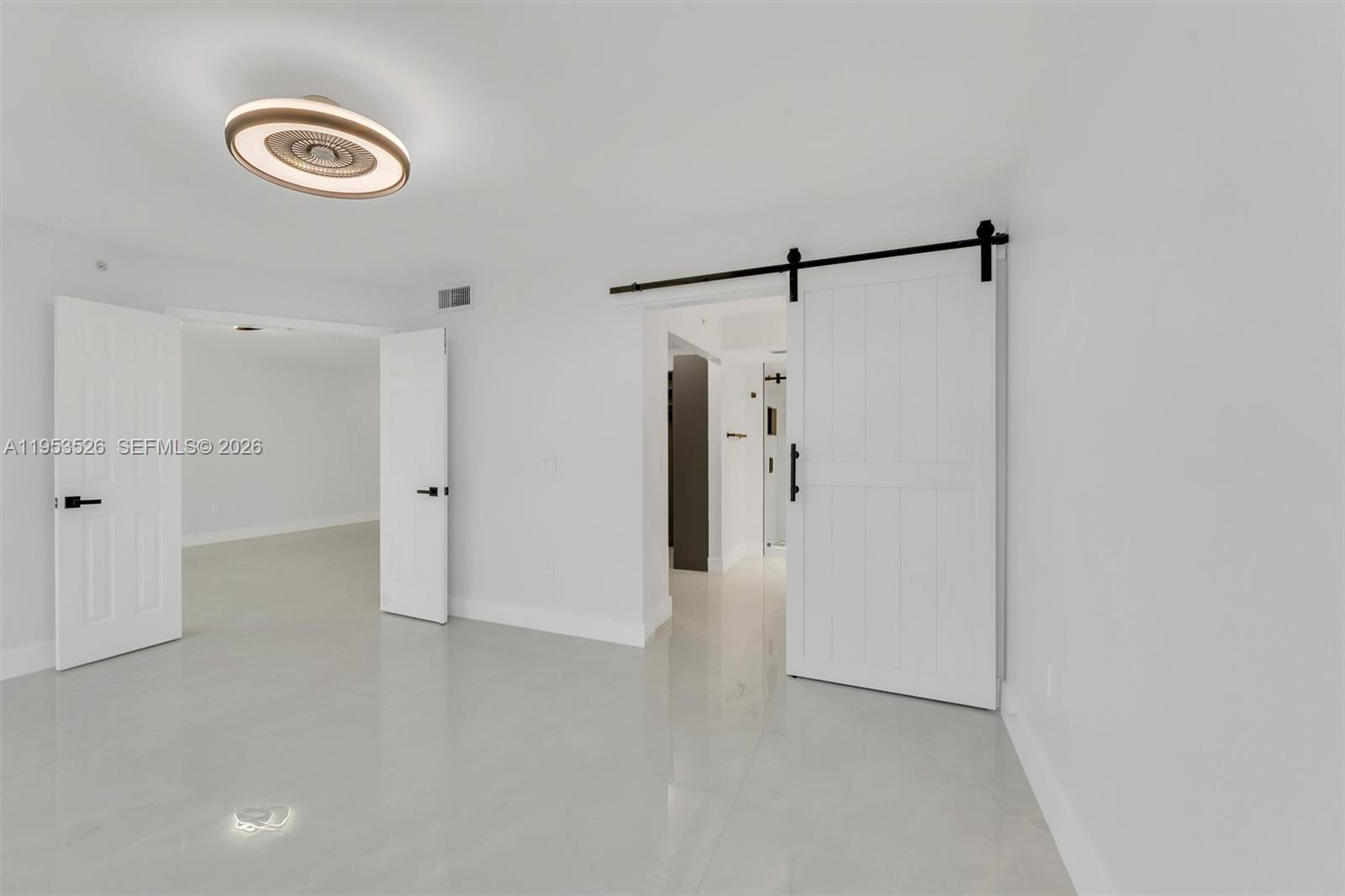 2601 North Nob Hill Road, Unit 407 Sunrise, FL 33322 - Photo 11 of 38 a view of empty room