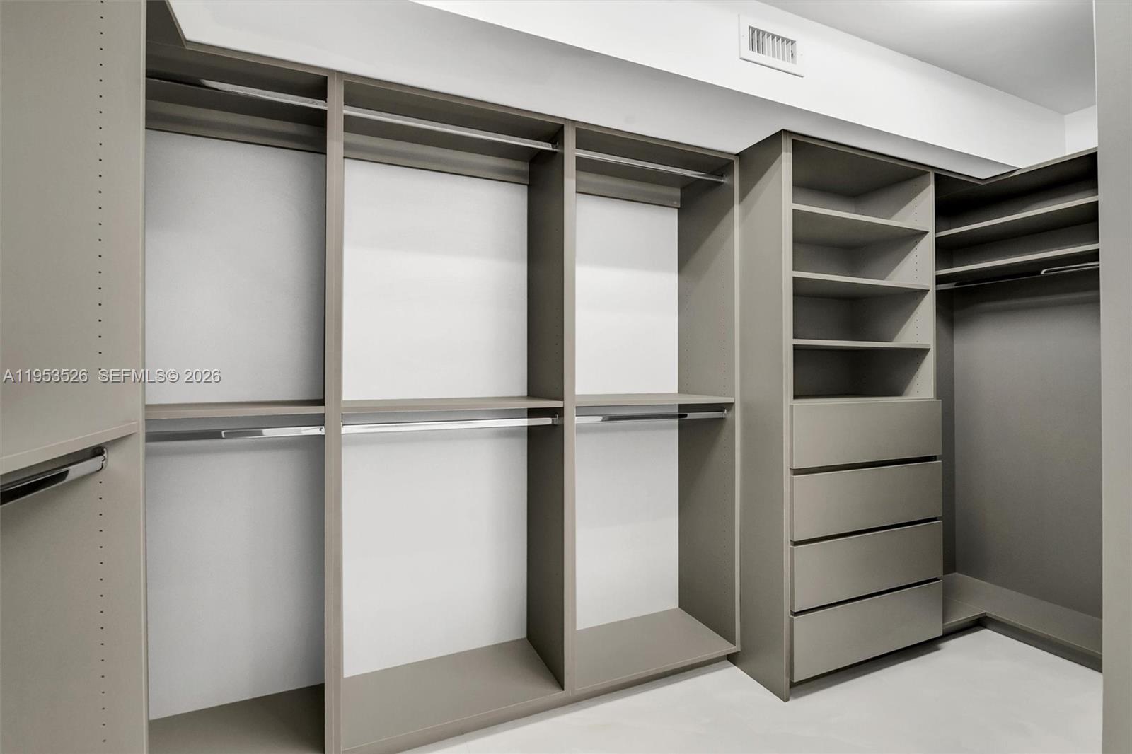 2601 North Nob Hill Road, Unit 407 Sunrise, FL 33322 - Photo 20 of 38 a view of an empty walk in closet