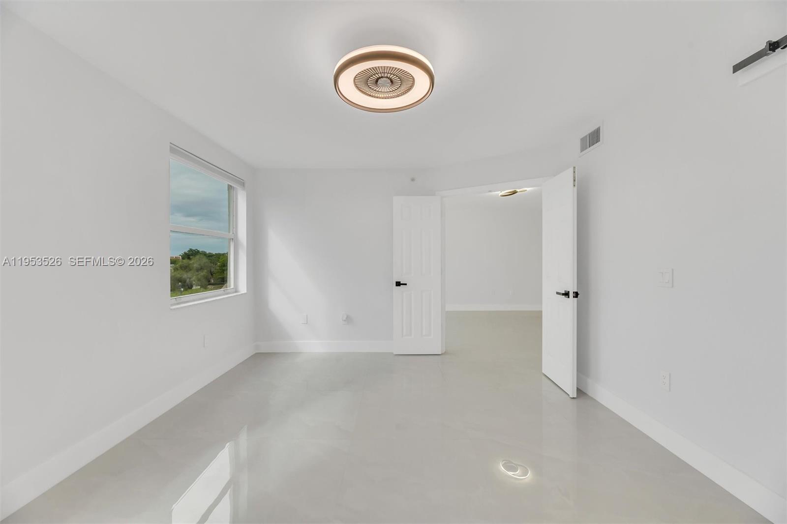 2601 North Nob Hill Road, Unit 407 Sunrise, FL 33322 - Photo 26 of 38 a view of empty room