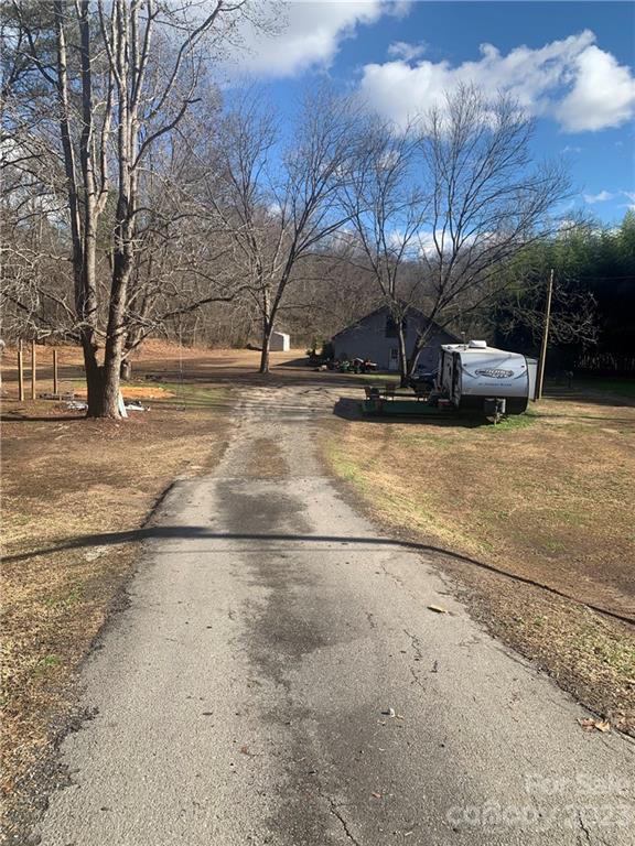 1290 Lloyd White Road, Unit 11 Clover, SC 29710 - Photo 1 of 11 a view of a backyard with large trees