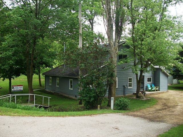 2755 Shaw Road Compton, IL 61318 - Photo 1 of 21 front view of a house with a street