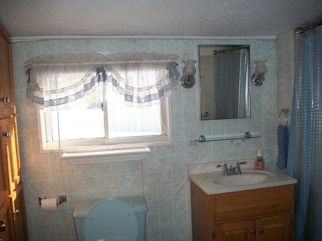 2755 Shaw Road Compton, IL 61318 - Photo 11 of 21 a bathroom with a sink a vanity and a mirror