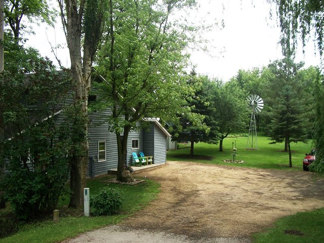 2755 Shaw Road Compton, IL 61318 - Photo 19 of 21 a view of a yard with plants and large trees