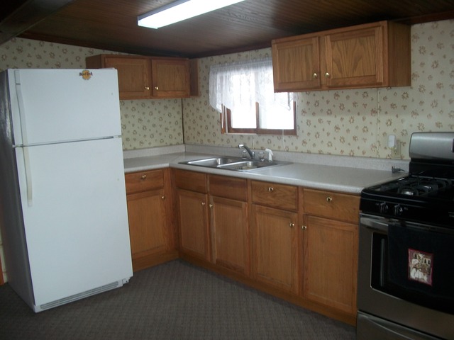2755 Shaw Road Compton, IL 61318 - Photo 5 of 21 a kitchen with a sink stove and refrigerator
