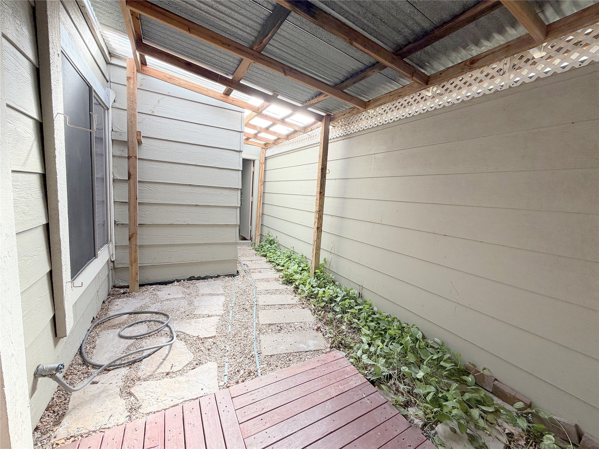 7103 Brendam Lane Houston, TX 77072 - Photo 22 of 24 Cover patio leads to 2 car Garage