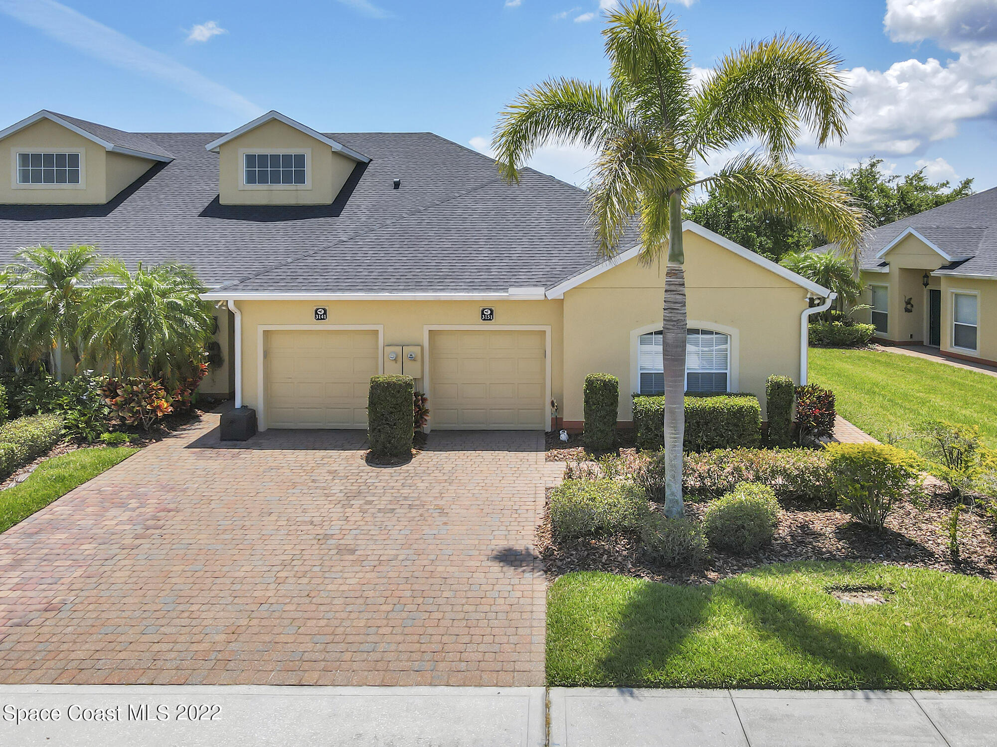 3151 Le Conte Street Melbourne, FL 32940 - Photo 1 of 30 a view of a house with a yard and potted plants
