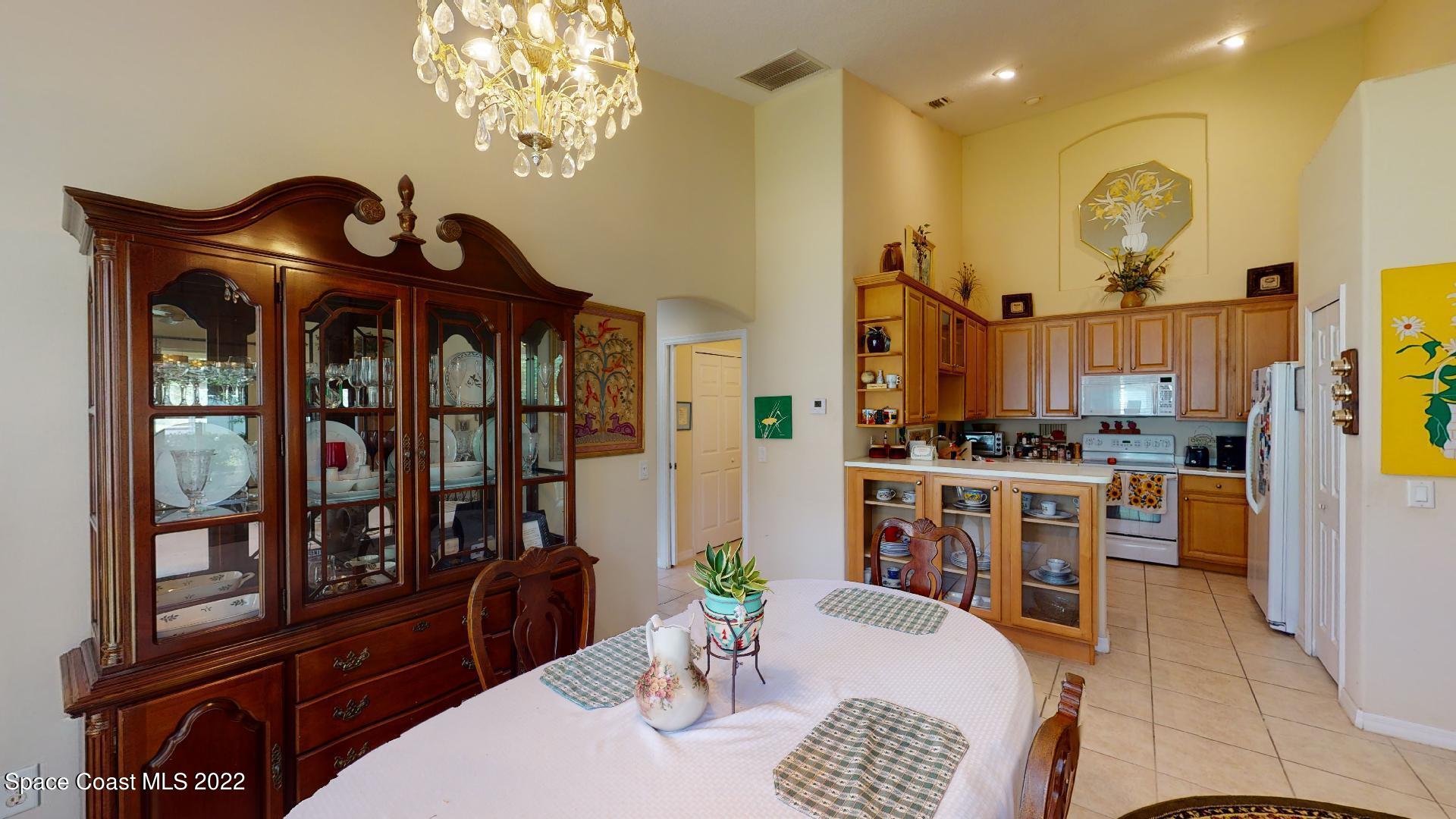 3151 Le Conte Street Melbourne, FL 32940 - Photo 16 of 30 a view of a dining room with furniture